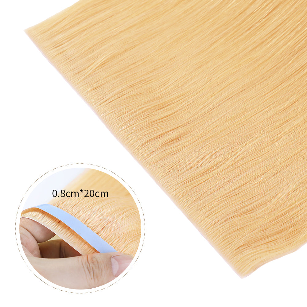 Close-up of (#27) Strawberry Blonde Tape Weft Hair Extensions