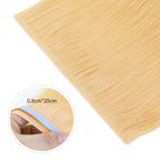 Close-up of (#27) Strawberry Blonde Tape Weft Hair Extensions