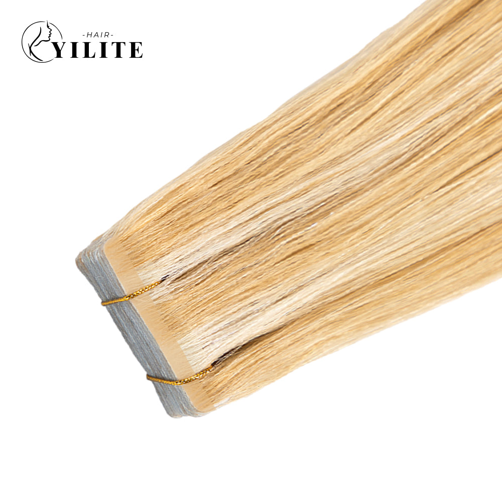 Close-up of (#P27/613)  Strawberry Blonde Bleach Blonde Narrow Mini Tape In Hair Extensions 