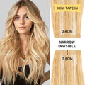 Model Wearing (#P27/613) Strawberry Blonde Bleach Blonde Narrow Mini Tape In Hair Extensions 