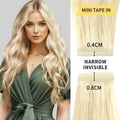 Model Wearing (#60) Platinum Blonde Narrow Mini Tape In Hair Extensions 